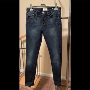 Used skinny blue jeans, size 29